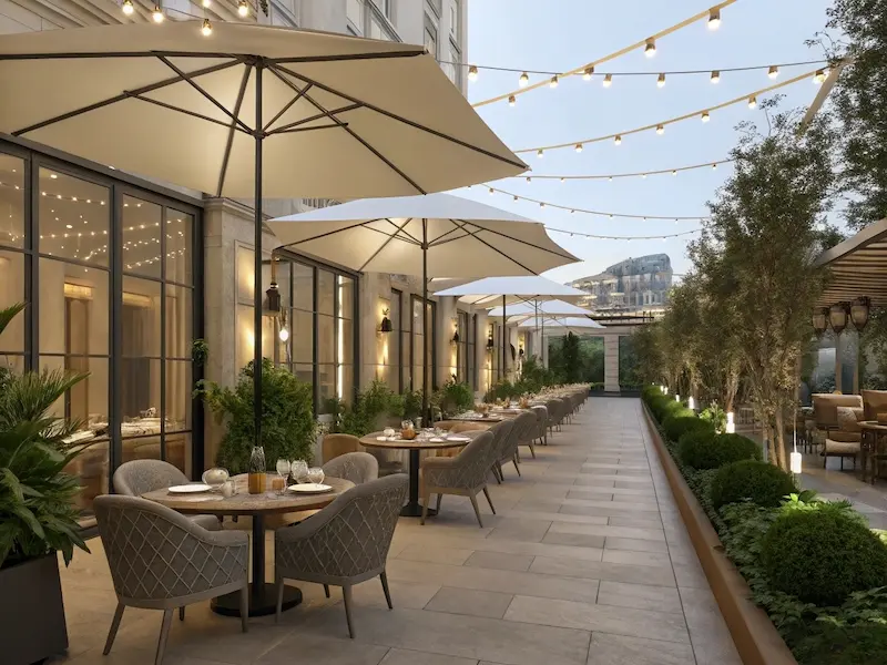 High-end restaurant patio with perfectly arranged commercial umbrellas creating an inviting atmosphere