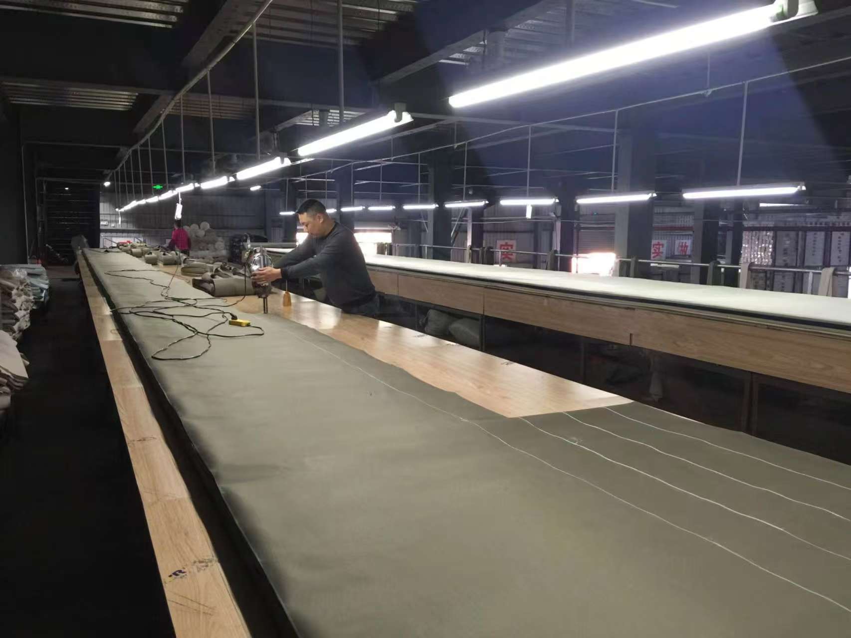 Automated assembly line for outdoor furniture production in a factory