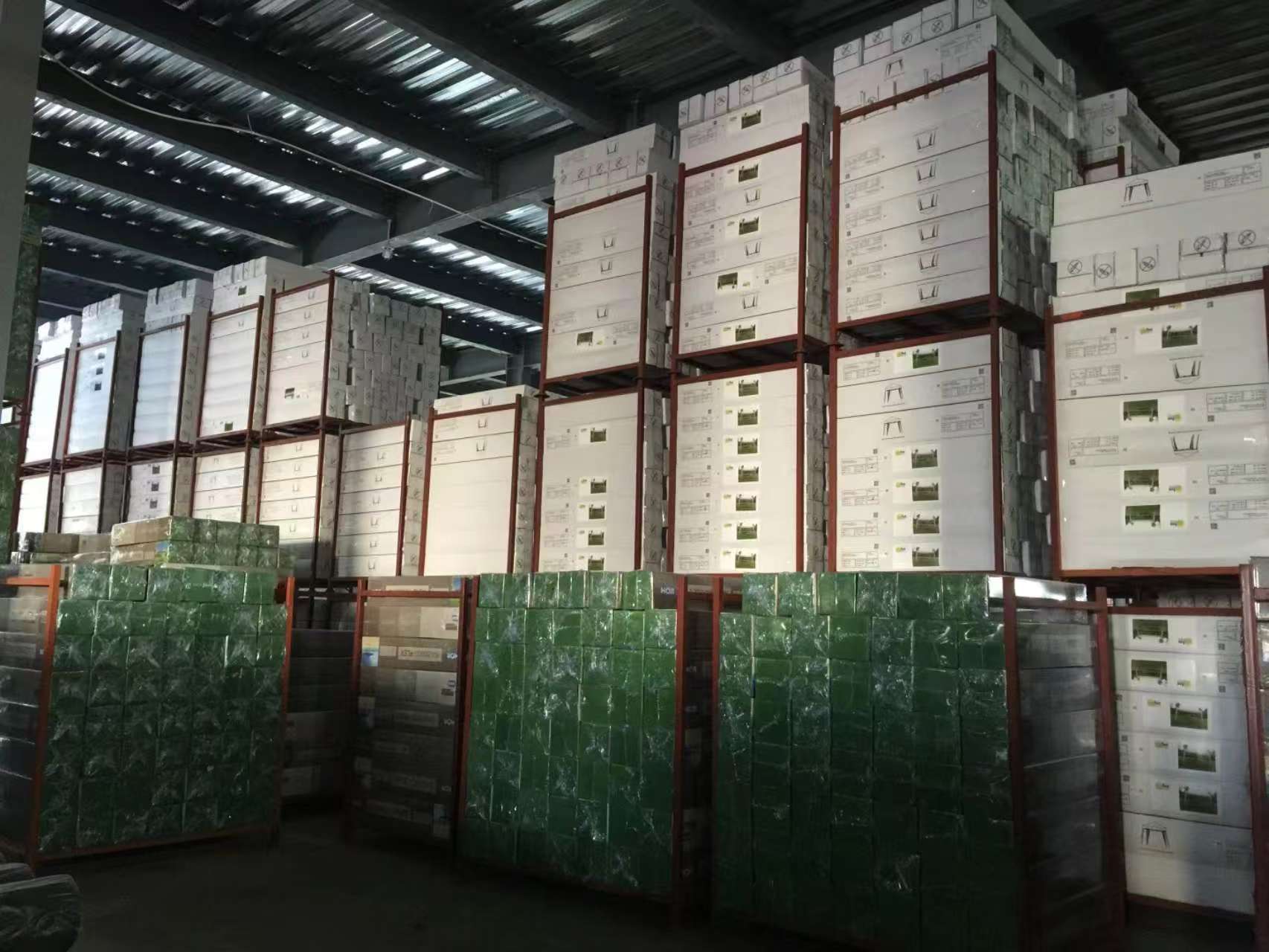 Storage area for materials in Patiofurnituresco factory showing organized resources for manufacturing outdoor furniture