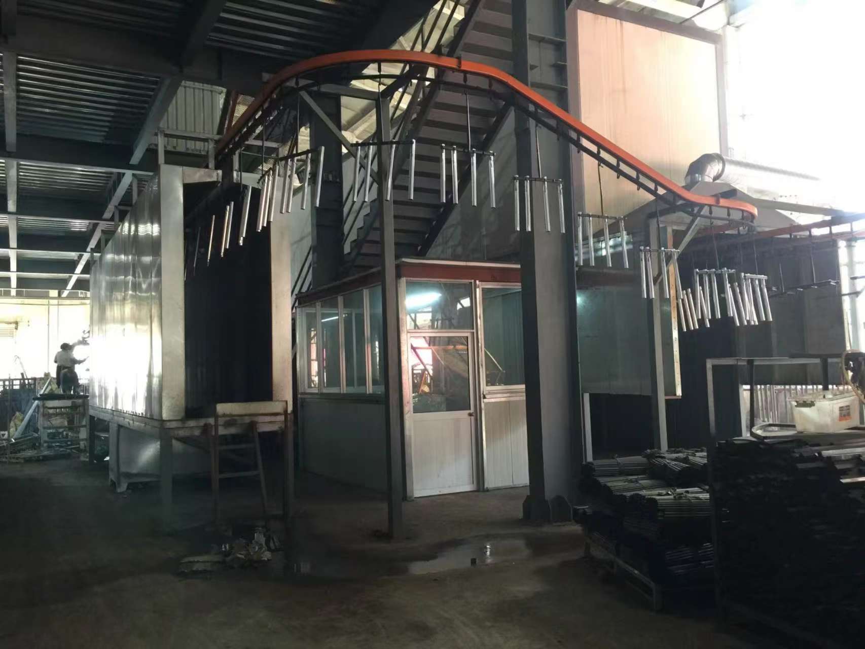 Interior view of Patiofurnituresco manufacturing facility showcasing outdoor furniture production