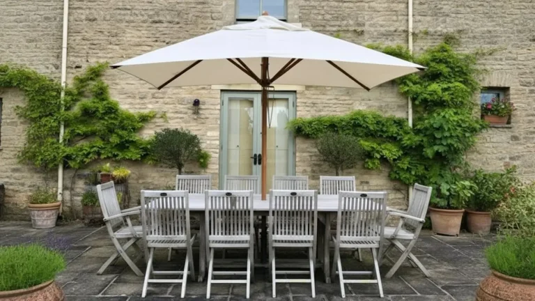Rectangular market umbrella over teak dining set rustic patio