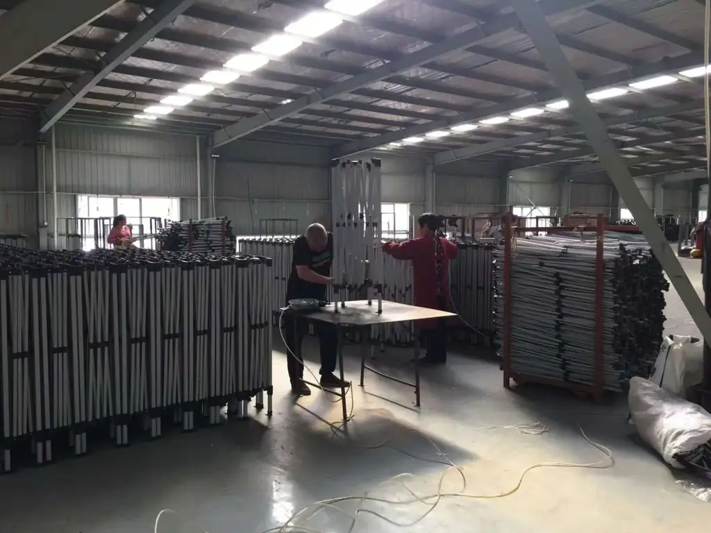 Factory workers assembling canopies in the Patiofurnituresco workshop